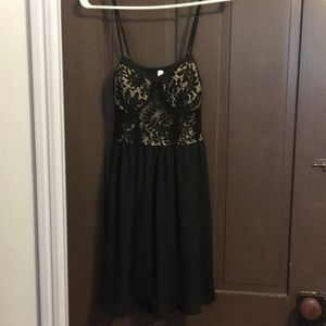 Black dress with nude tone accents